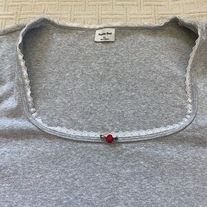 Aritzia grey rosette top.